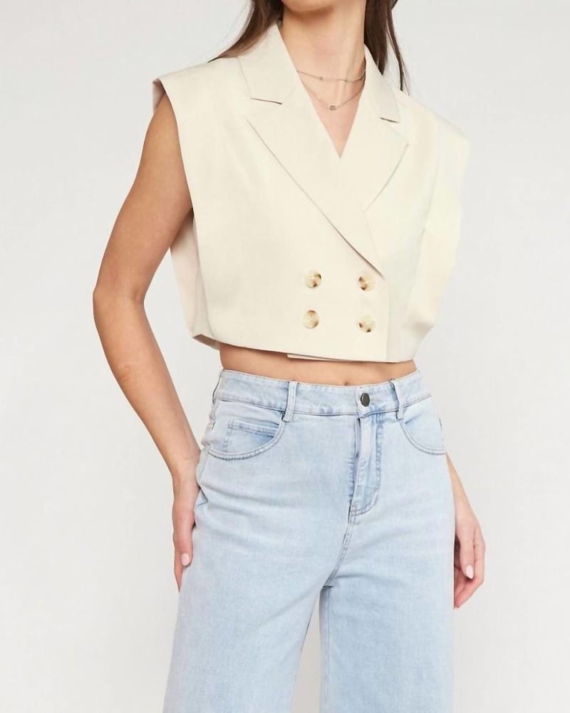 Front of a model wearing a size Large Double Breasted Cropped Vest in Natural in Natural by entro. | dia_product_style_image_id:326138